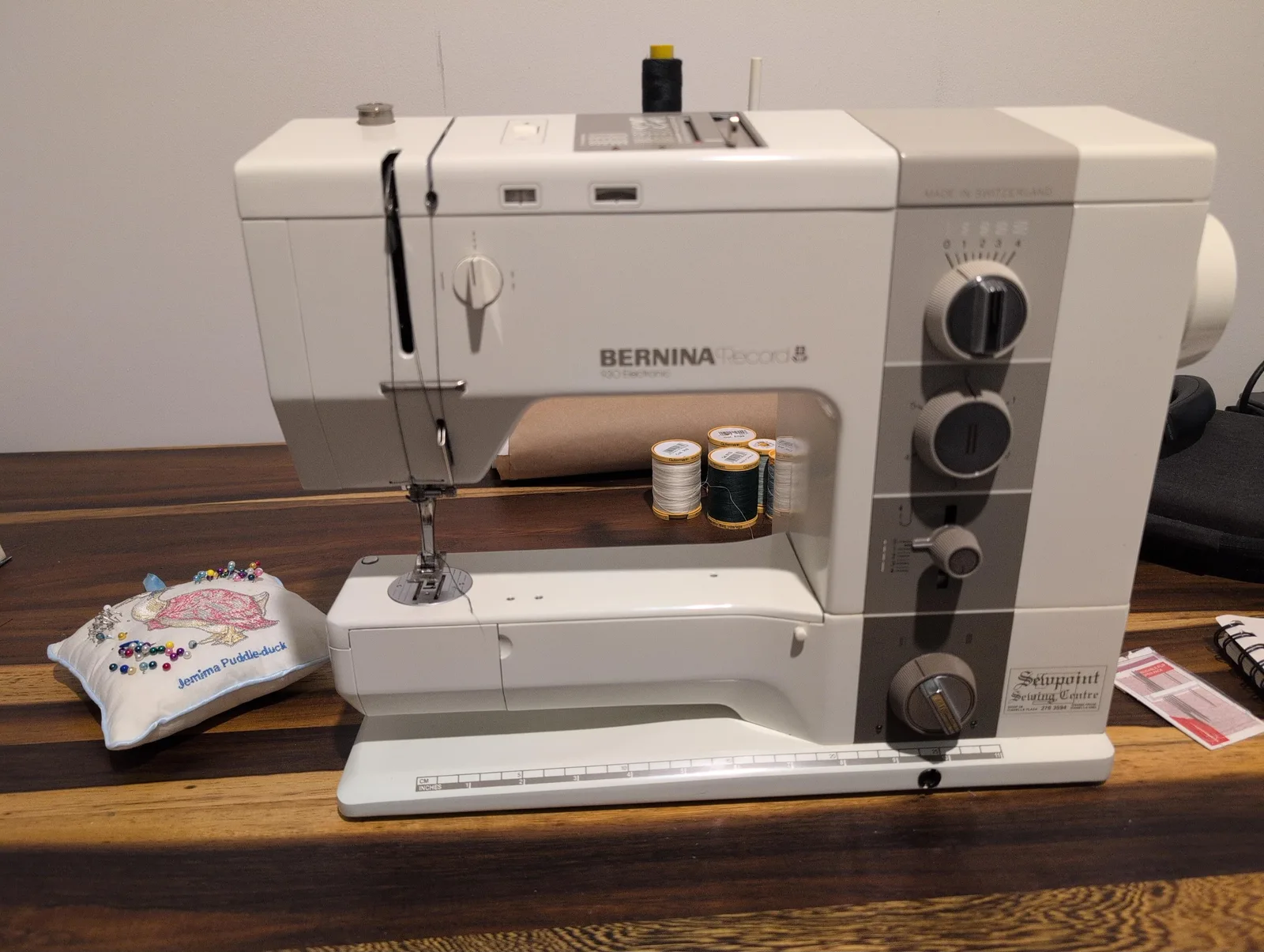 A hand-drawn illustration of a Bernina 930 Record sewing machine
